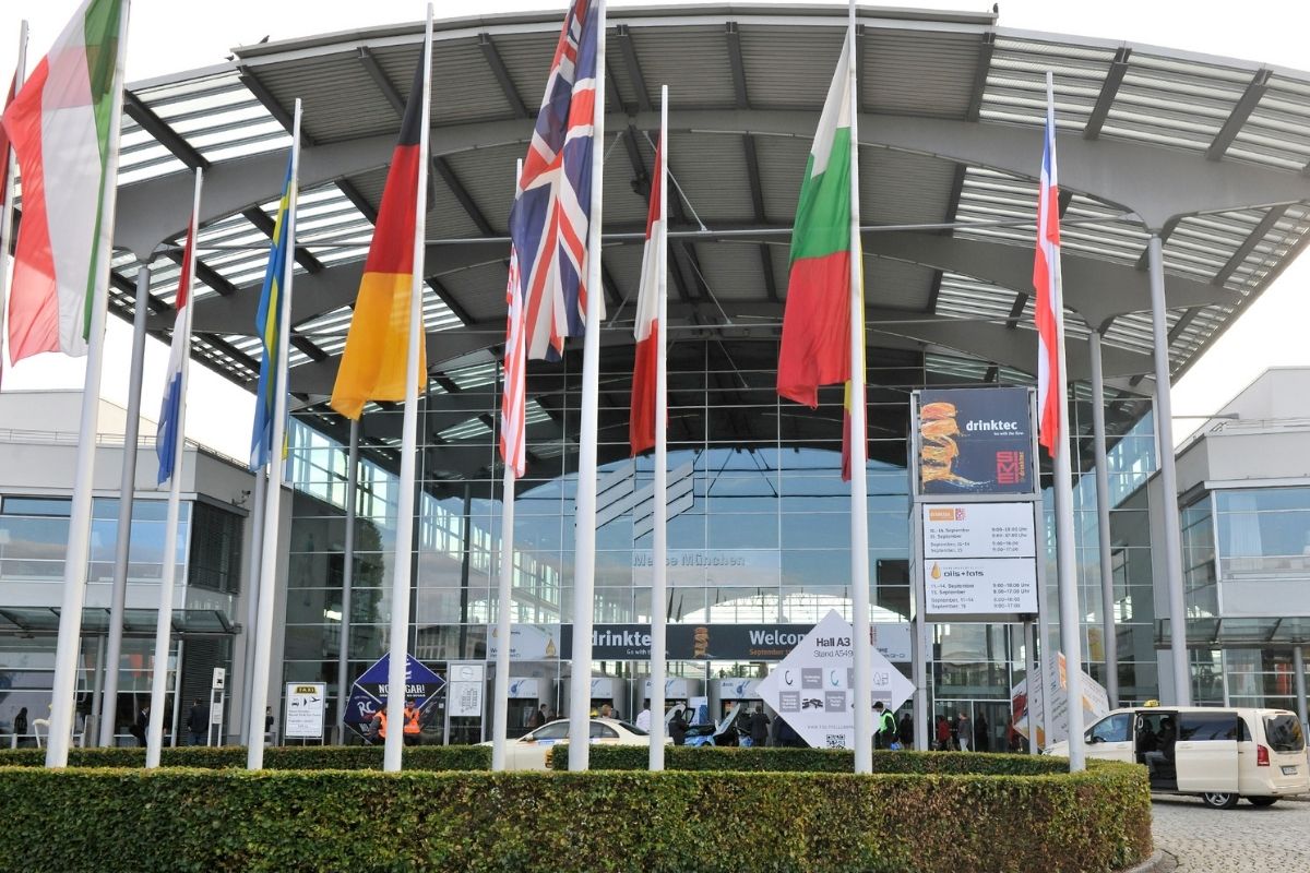 Flags from 8 different countries outside the drinktec building