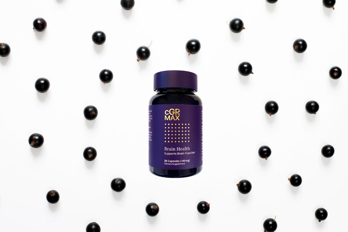 Blackcurrants circling a jar of the cGPMax supplement