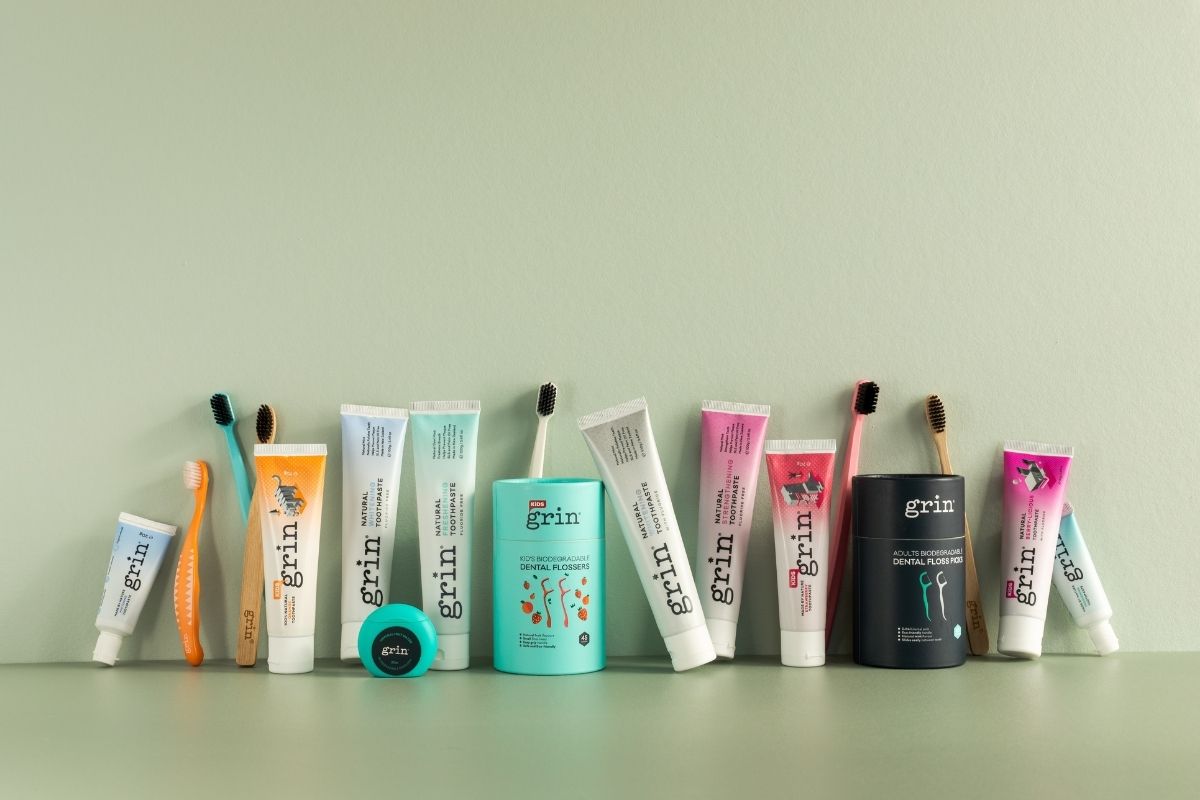 Grin Natural's product range of tooth brushes, toothpastes and dental floss sticks
